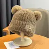 Gorro de lana nuevo de invierno 2024, gorro de punto con protección para las orejas de felpa, estilo coreano, bonito gorro de oso a la moda, combina con todo.