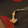 Llavero de tetera mini con forma de corazón de latón, diseño original, correa para teléfono tejida a mano, cordón para llaves, accesorio para llave de coche
