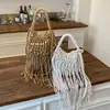 Bolso tejido para mujer, nuevo modelo de verano 2026, nicho y súper popular, bolso de hombro para el trabajo, bolso cruzado con borlas, bolso de playa de paja