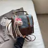 Bolsas de Nicho Estilo Occidental para Mujer 2025 Nuevo Estilo Coreano Color Contrastante Bolso Bandolera Mochila Mochila de Viaje Retro a la Moda