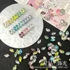 Wuzhou K9 súper brillantes 6x10 diamantes de imitación con forma de huevo de paloma 1:1 réplica de accesorios de uñas decorativas Huazi de fondo puntiagudo DIY