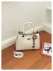 Bolsa de mão ins elegante de alta qualidade, bolsa de ombro e crossbody, novo estilo vintage 2026, bolsa tipo saco popular para o dia a dia para mulheres