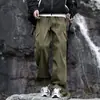 Pantalones de Trabajo para Hombre Marca Americana de Moda Resistentes al Viento Primavera y Otoño Streetwear Plisados Estilo Paracaídas Color Sólido Pierna Recta Pantalones Largos