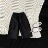 Pantalones de algodón puro para niño de otoño 2026 nuevos y elegantes para bebé, pantalones cargo casuales de primavera y otoño, pantalones largos versátiles para bebé