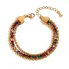 Moda europeia e americana nicho elegante pulseira retrô aço inoxidável banhado a ouro 18K pulseira de três camadas com microincrustação de flor de coração de pêssego para mulheres