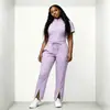 Uniformes de exfoliación amigables con la piel de sitio internacional, uniformes médicos de pantalón corto con cremallera transfronterizos europeos y americanos para médicos y enfermeras