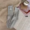 Calcetines de tela de color liso para otoño e invierno con bordes rizados, calcetines versátiles de media pantorrilla estilo preppy, calcetines de algodón puro Zhujie para otoño e invierno