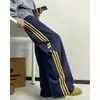 Pantalones de chándal anchos con estampado de letras retro americano y tres rayas para hombre y mujer, marca de moda, holgados, casual, deportivos, versátiles, largos
