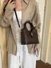 Bolso tipo cubo de alta gama transfronterizo de nicho, bolso cruzado moderno y versátil, bolso de mano casual y simple, bolso de hombro, bolso para el trabajo