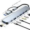 Estación de Acoplamiento Siete en Uno de Doble Cabezal USB/TYPEC Unidad Flash USB Tarjeta de Carga PD Lector de Tarjetas Hub Expansor Multi-Puerto