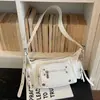 Bolso de Diseño de Nicho Texturizado de Alta Gama Transfronterizo para Mujer Primavera 2026 Nuevo Bolso Tote Simple Bolso de Hombro Bajo el Brazo Cruzado