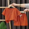 Traje de manga corta para niños verano nuevo pantalones cortos para niños coreano gofre para bebé verano ropa infantil al por mayor