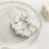 Tocado de tela bm Anillo para el cabello de intestino de cerdo Lazo de intestino grueso Estilo retro francés Cuerda para el cabello para mujer Banda para el cabello Popular en Internet Cuerda para el cabello coreana simple