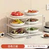 Suporte multifuncional de vários níveis para preparação e armazenamento de utensílios de cozinha, incluindo tigelas, pratos, panelas quentes, travessas e legumes.