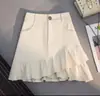 Mini Falda de Minifalda Negra de Mezclilla Delgado de Línea A de Cintura Alta con Volantes Irregulares 2026 Otoño Nueva Llegada