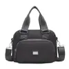 Bolsa de Hombro para Mujer de Venta Caliente Nueva Primavera Tela de Nylon Tendencia Transfronteriza Mochila Multifuncional para Mujer Bolso de Mano
