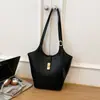 Bolso cruzado para mujer 2026 Diseño de nicho Bolso de axila francés Bolso de mano de alta gama Bolso de hombro retro a la moda para el trabajo