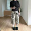 Venta al por mayor de fabricante jeans cortos camuflados de estilo urbano americano para hombre, pantalones cargo rotos, shorts holgados de pierna ancha para hombres y mujeres