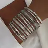 Moda Europea y Americana Nuevo Estilo Moda Personalizada Grabado Trenzado Geométrico Multicapa Apilados Pulseras Set de 10 Piezas Accesorios Al por Mayor