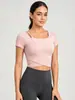 Nuevo estilo de top de yoga asimétrico cruzado con sujetador incorporado, ajuste ceñido, adecuado para Pilates, fitness y entrenamientos, de manga corta, para mujer