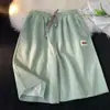 Pantalones cortos atléticos de verano para hombre, finos, fluidos, de seda helada, transpirables, corte holgado, de cinco puntos, estilo americano de moda, pantalones cortos casuales