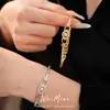 Pulseira redonda com fecho de flor cravejada de zircônia banhada a ouro real, toque de luxo leve de nicho de alta qualidade, acessório de mão requintado e único