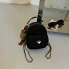 Shuai Mijia 2026 Colección Otoñal Nueva: Mochila Elegante Estilo Coreano con un Diseño de Alta Gama, que Presenta una Correa de Cadena y un Delicado Bolso Cruzado