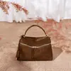 Nova bolsa de mão de couro genuíno estilo coreano para outono/inverno, uma bolsa de almoço de alta qualidade e luxuosa, com acabamento em camurça, grande capacidade e projetada como bolsa de ombro ou bolsa transversal.