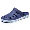 Sandalias Baotou para Hombre Verano Nuevas Tacón Plano Suela Suave Antideslizantes Resistentes al Desgaste Huecas para Exteriores Wading Agujero Bidireccional Zapatos Modernos