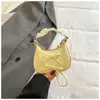 Elegante bolso de axila Xiaomi de nicho para mujer 2026 nuevo bolso de moda de un solo hombro cruzado elegante bolsa tipo bola con lazo