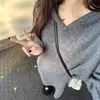 ¡Artículos de Calidad de las Trece Líneas de Guangzhou! Vestido de punto con capucha casual, elegante, perezoso, holgado, normcore, para Otoño e Invierno 2025