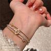 Lindo nicho pulseira rosa claro 2023 estilo suave design sentido menina doce pulseira de três camadas Pulseira Círculo