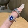 Anillo abierto de topacio azul de imitación con diseño de huevo de paloma retro francés, anillo ajustable de circonita de alta calidad para mujer