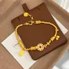 Nuevo estilo chino antiguo bañado en oro esmalte rojo y azul brújula de ocho tesoros amuleto de la fortuna calabaza pulsera exquisita para mujeres venta al por mayor