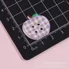 Botones de rejilla de dibujos animados, accesorios de resina de manzana, pinzas para el pelo de pegamento de crema DIY, accesorios para el pelo de zuecos, llaveros, imanes para refrigerador