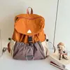 Mochila escolar elegante de gran capacidad para estudiantes de primaria, diseño de bloques de color, mochila infantil unisex, estilo deportivo, mochila infantil para deportes al aire libre, moderna