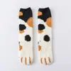 Calcetines de media pantorrilla a rayas con diseño de pata de felino grande que no sueltan pelusa para mujer, Calcetines cálidos de piso para el hogar de Otoño e Invierno, Calcetines de dormir de forro polar de coral al por mayor