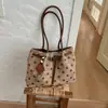 Bolso de mano informal relajado, moda otoño 2026 nuevo, bolsa de compras de lunares de gran capacidad, bolso de hombro, bolso de axila