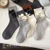 Calcetines de moda para otoño e invierno, calcetines lindos de gato para mujer, calcetines de estilo japonés ins de moda de terciopelo sintético hasta la pantorrilla, calcetines de dibujos animados de Zhuji
