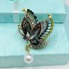 Broche de diamantes de aleación de alta calidad retro, elegante diseño de mariposa, pin femenino, personalidad antiexposición, accesorios al por mayor
