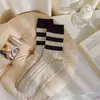 Calcetines nuevos de otoño e invierno para mujer, de media pantorrilla, de moda, Mori, japoneses y coreanos, clásicos, combinables, de media pantorrilla, estilo universitario.