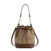 Nuevo bolso cubo vintage premium Koujia para mujer 2026, nuevo bolso cruzado retro, bolso de mano con cordón moderno y versátil