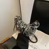 Bolsos de Peluche Transfronterizos para Mujer Otoño 2026 Nicho Estampado de Leopardo Bolso de Hombro Moderno Moda Viajero Cruzado Bolso Dumpling