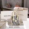 Entrega em uma peça moda super popular Bolsa tote jeans 2024 Novo bordado bolsa piano retrô atacado