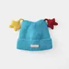 Nuevo gorro de invierno para niños con estrella y orejas de gato, gorro de lana para niñas, gorro de punto grueso a prueba de viento y cálido para bebés niños