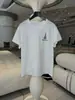 26 T-shirt de Algodão de Torção Alta Lavada com Enzima de Ar Estilo Novo de Início de Primavera Gola Redonda Bordada Caimento Solto Manga Curta Reta