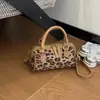 Bolso de lona estilo coreano 2026 nuevo modelo Bolso Boston versátil para mujer de uso diario Bolso de hombro cruzado dulce estilo coreano