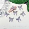 Nuevos accesorios para uñas Joker viento ins morado grisáceo flores pequeñas tridimensionales luminosas mixtas accesorios para usar al por mayor