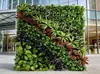 Decoración de pared de fondo anti-decoloración planta artificial pared pared de plantas verdes balcón flores falsas césped de plástico escaparate tienda decoración