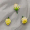 DIY simulación Botón de Rosa Té Bud flor de hueso pequeña corona de capullos de flor caja de dulces corsage flor decorativa pulsera de flor de seda producción